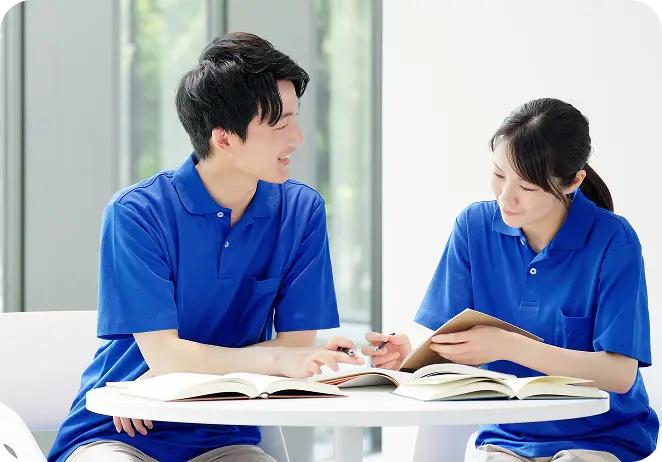 PT・OT・STのスタッフが資料を確認している様子